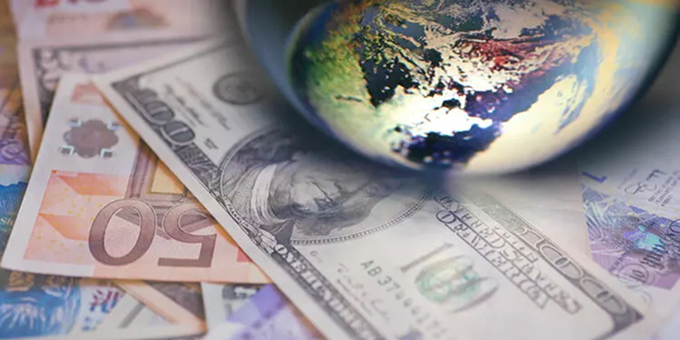 Globe with various currencies, world financial markets.